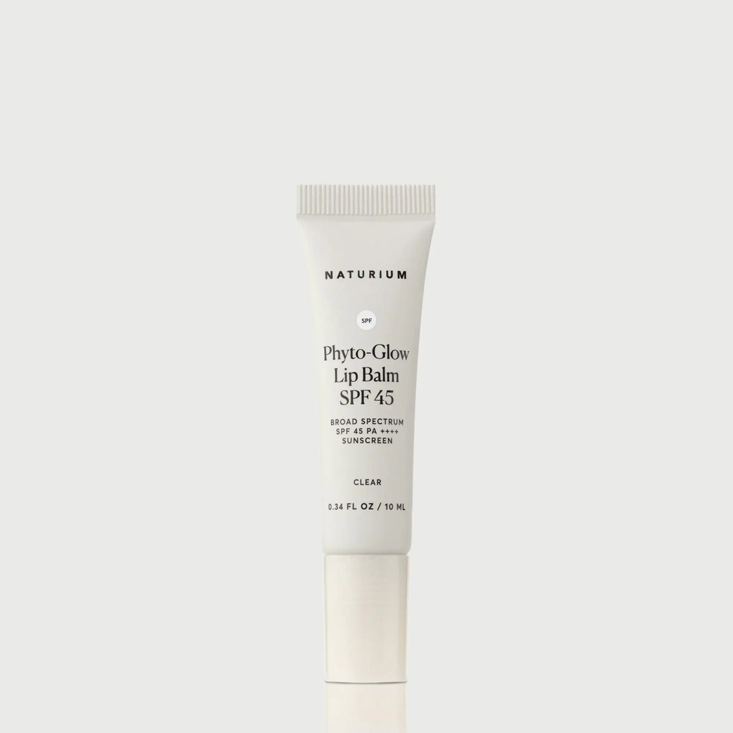 phyto-glow-lip-balm-spf-45-clear-n4 NATR-10124_PhytoGlow_SPF_Clear_primary_capon_front_bonebkgd_1.webp